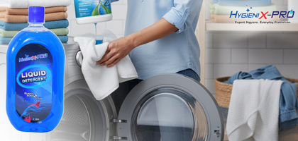 A person pouring liquid detergent into a machine.